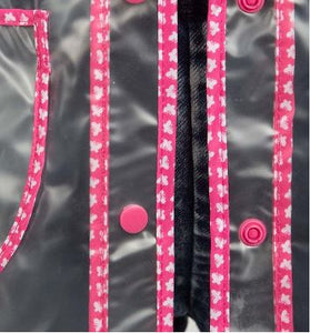 Clear raincoat with pink butterfly trim