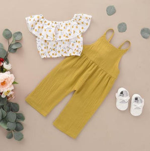 Two piece white floral blouse and ocre coloured dungarees